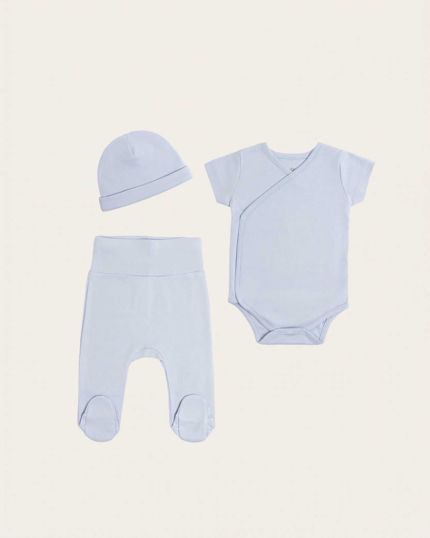 Set body kimono manga corta, pantalón con pie y gorro de bebé · Celeste · Pima orgánico GOTS