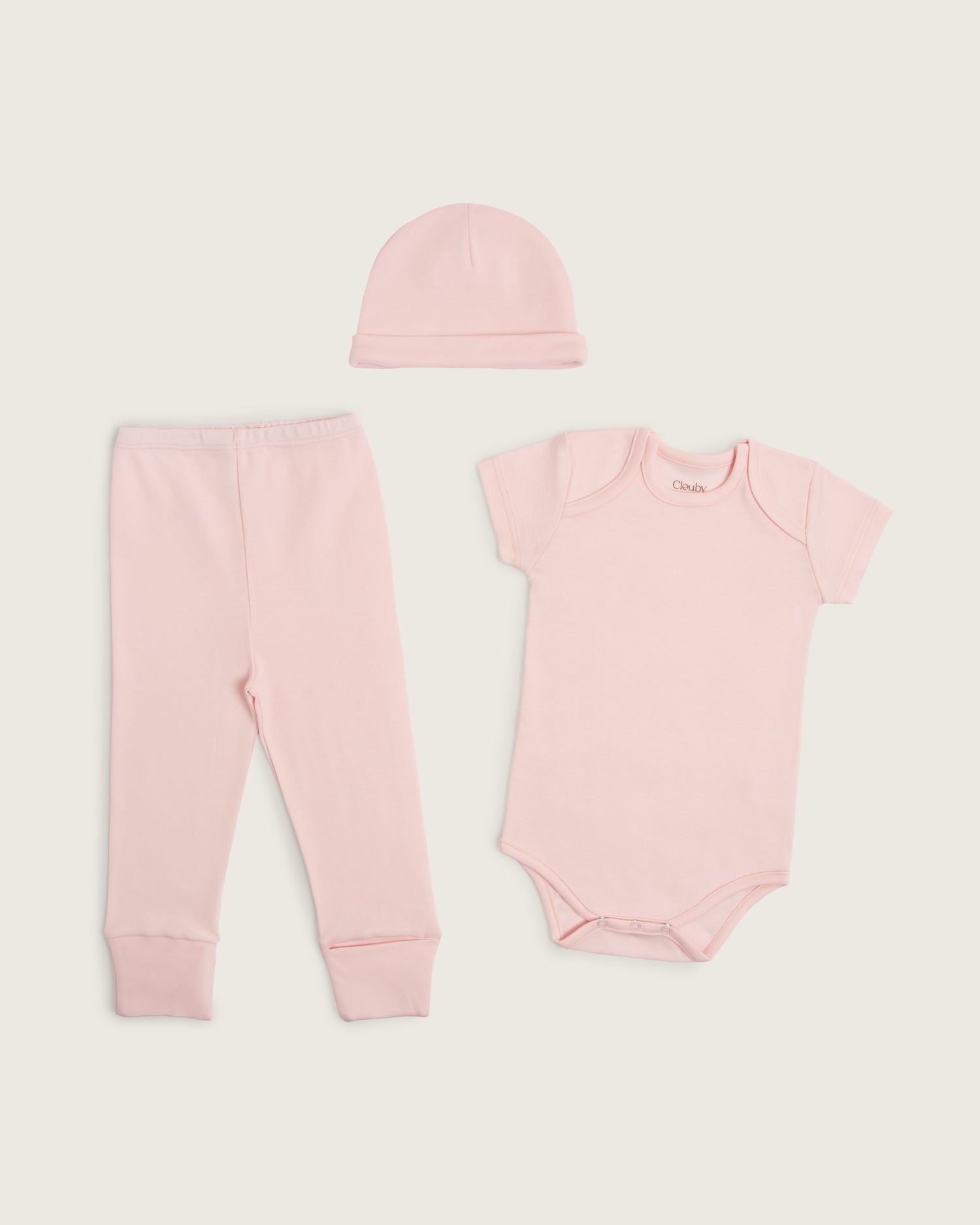 Set body manga corta, pantalón convertible y gorro de bebé · Rosa · Pima orgánico GOTS