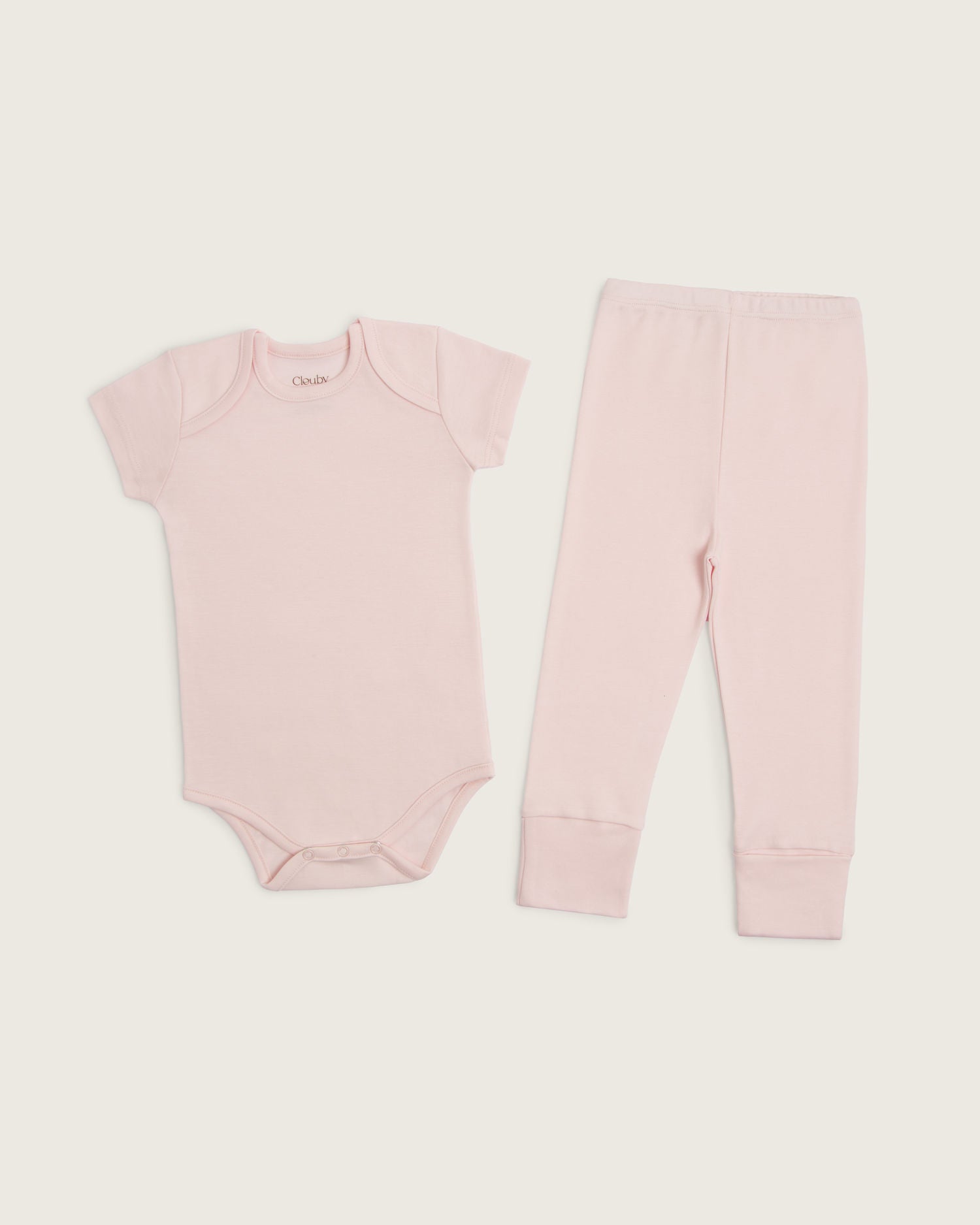 Set body manga corta y pantalón convertible de bebé · Rosa · Pima orgánico GOTS