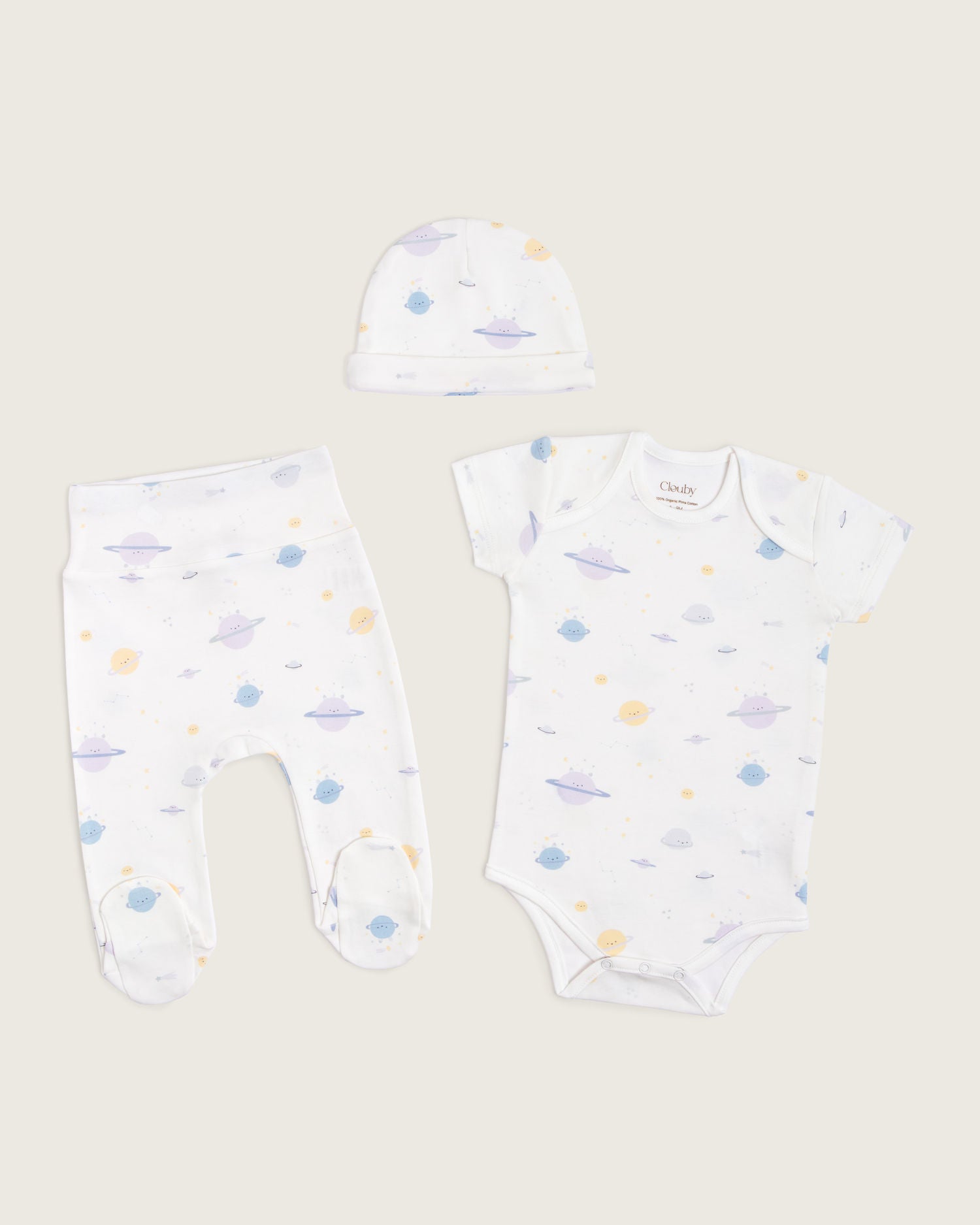 Set body manga corta, pantalón con pie y gorro de bebé · Estampado Planetas · Pima orgánico GOTS