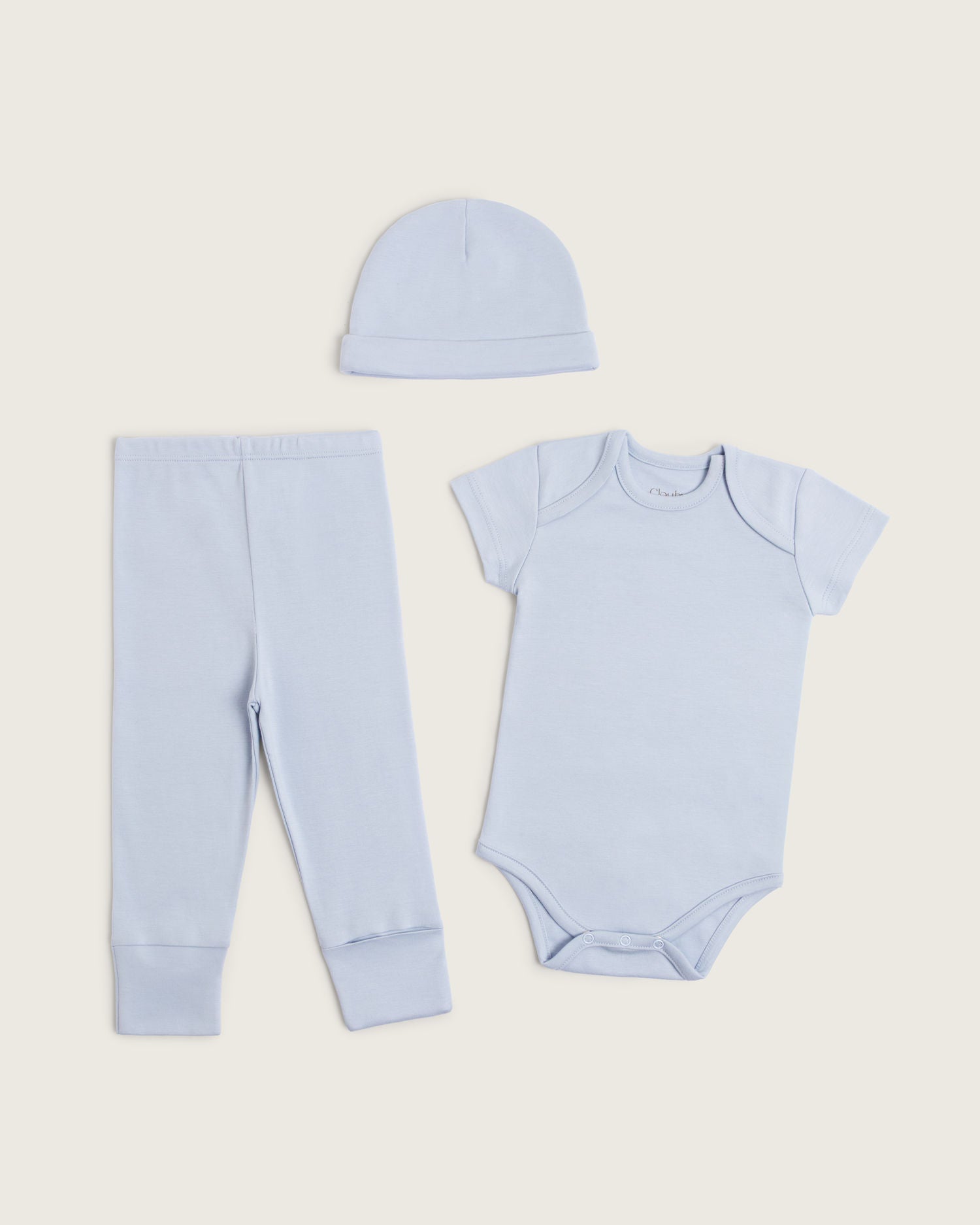 Set body manga corta, pantalón convertible y gorro de bebé · Celeste · Pima orgánico GOTS