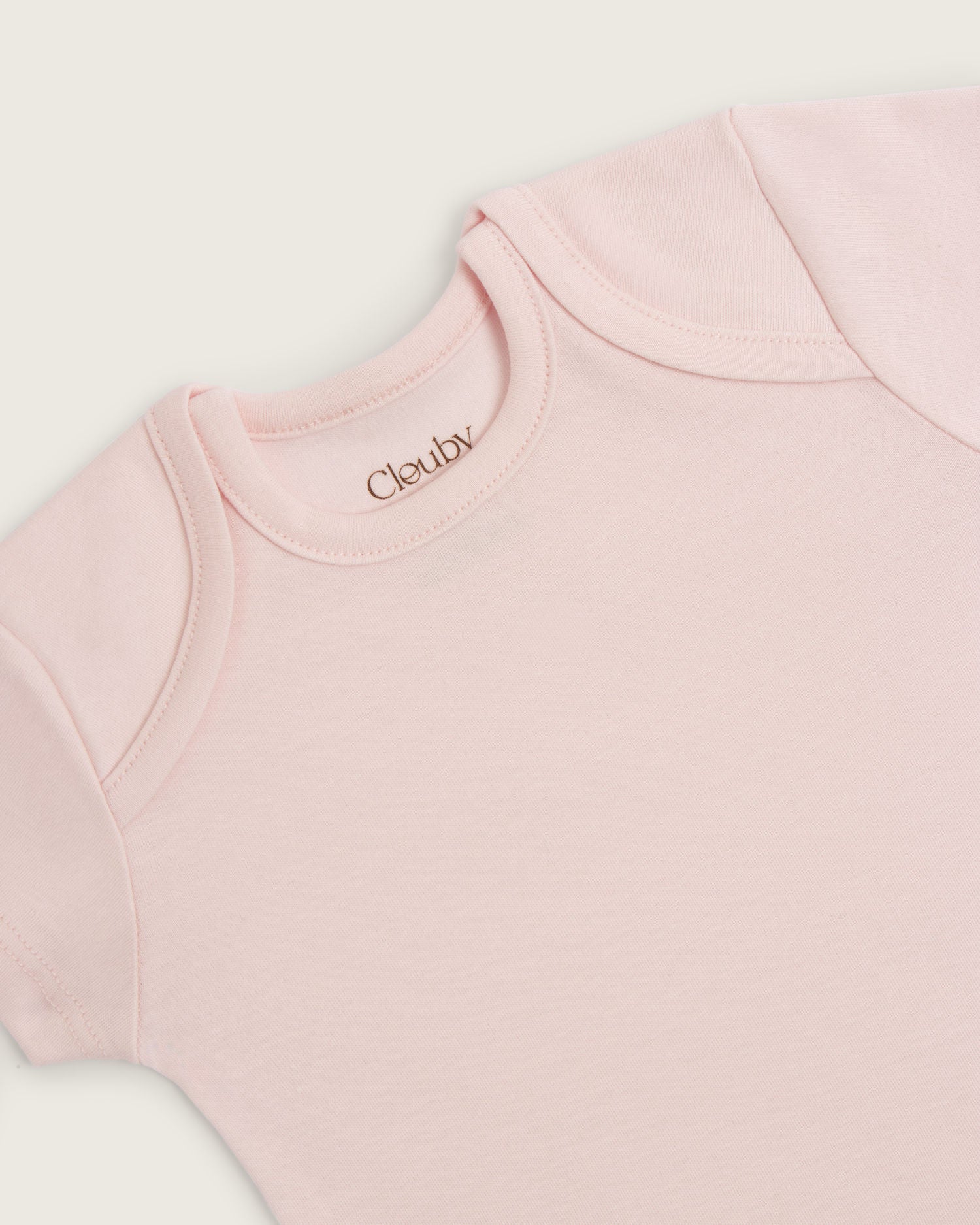 Set body manga corta, pantalón convertible y gorro de bebé · Rosa · Pima orgánico GOTS