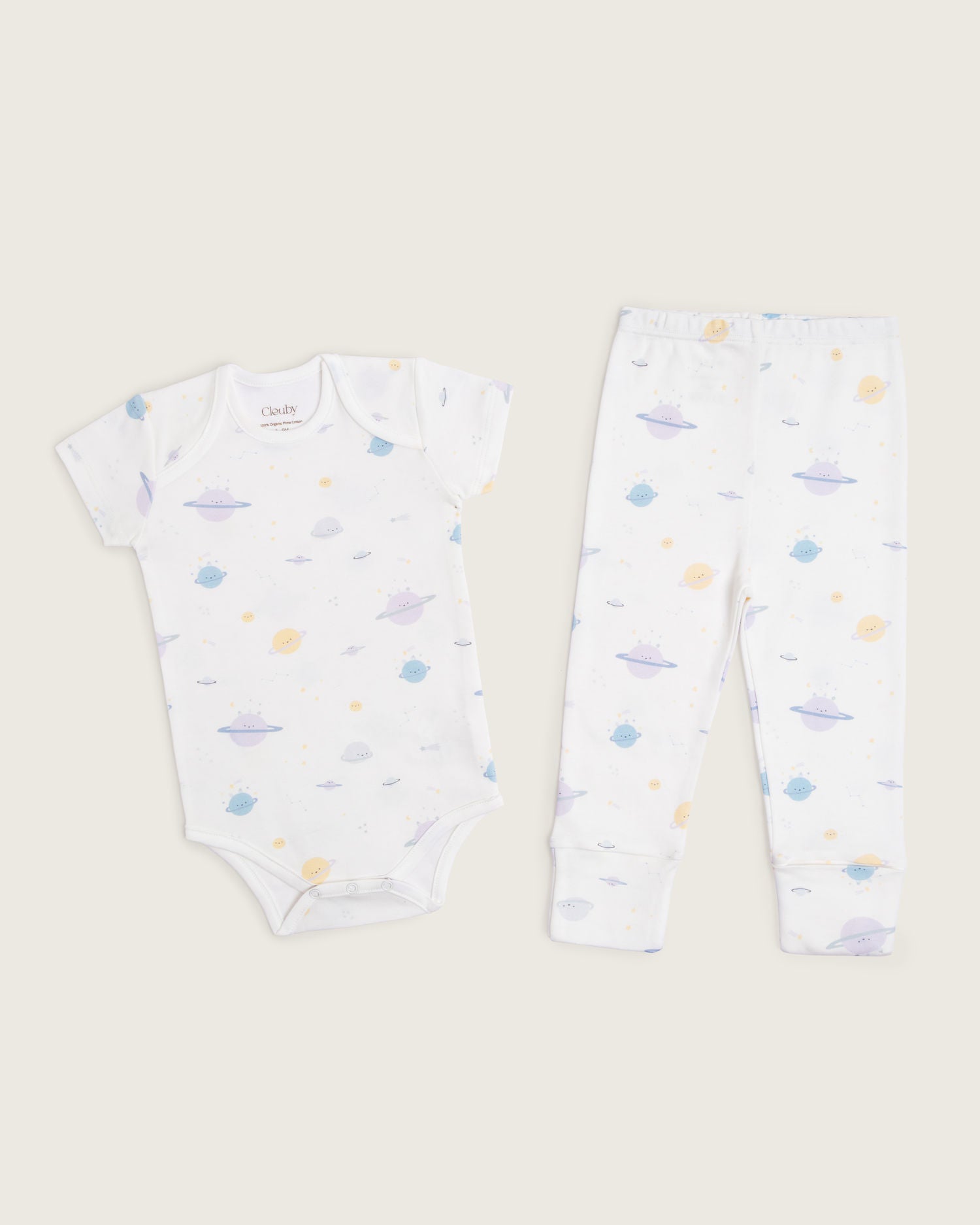 Set body manga corta y pantalón convertible de bebé · Estampado Planetas · Pima orgánico GOTS