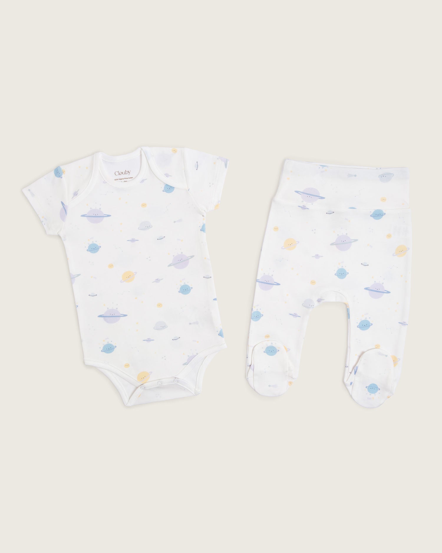 Set body manga corta y pantalón con pie de bebé · estampado planetas · Pima orgánico GOTS